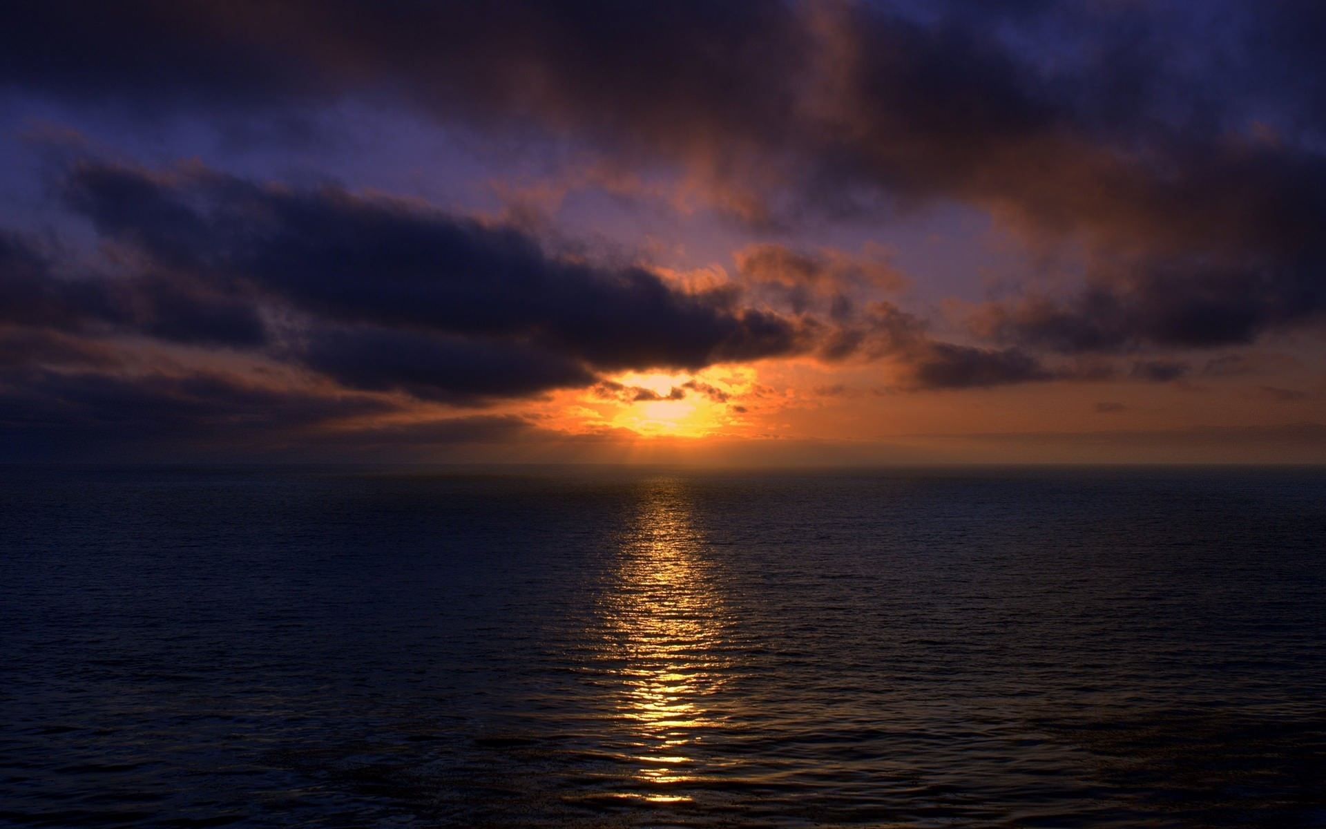 comwallpaperssunset wallpaperssunset over ocean wallpaper 1920x1200