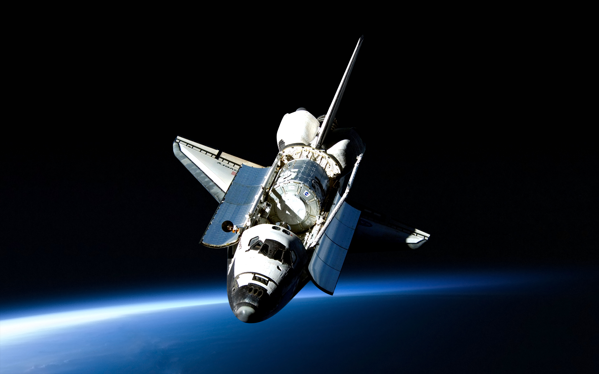 Space Shuttle Discovery posing for a great wallpaper space 1920x1200