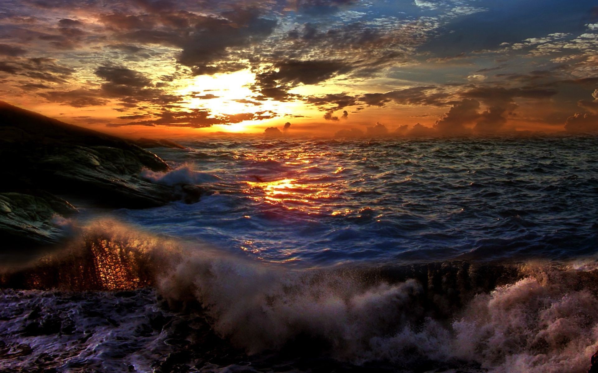 Zastaki Com Sunset on a Stormy Sea Wallpaper 1920x1200